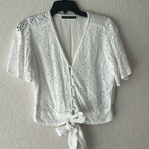 White Abercrombie XS top with cut out details, v neck, button front